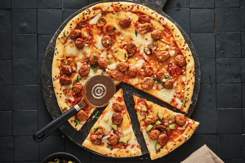 Pizza aux palets de boeuf